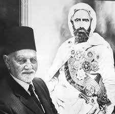 الأمير محمد سعيد مع صورة لجده الأمير عبد القادر الجزائري